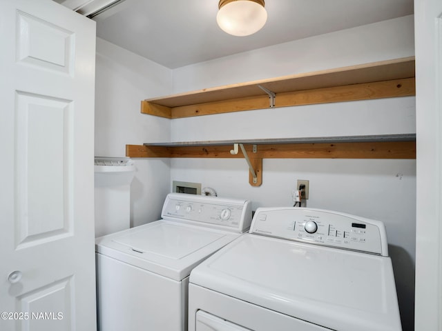 3792 E Ramble Wood Dr, Flagstaff, AZ 86004 - clothes washing area with washing machine and clothes dryer and laundry area
