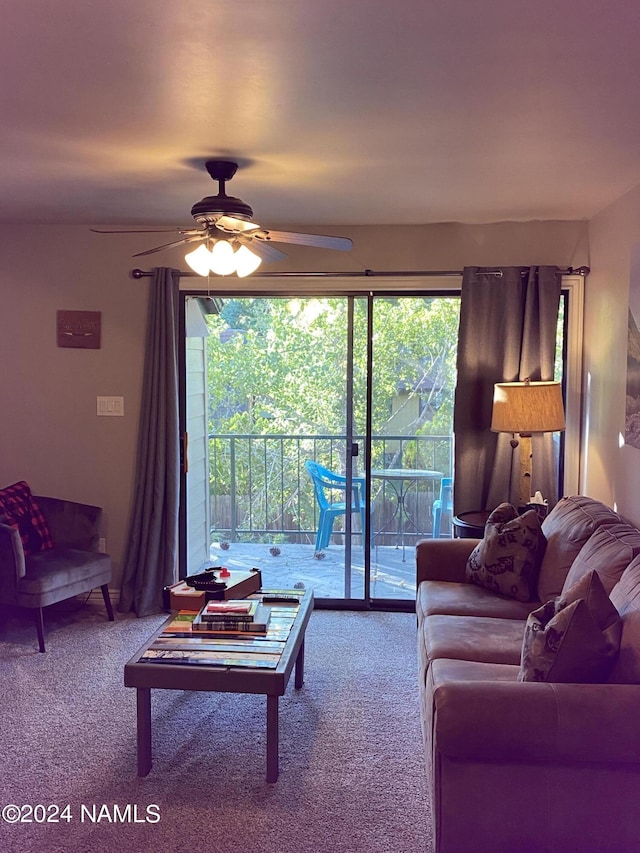 carpeted living room featuring ceiling fan