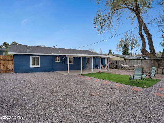 2821 N Tindle Blvd, Flagstaff, AZ 86004 - back of house featuring a patio and fence