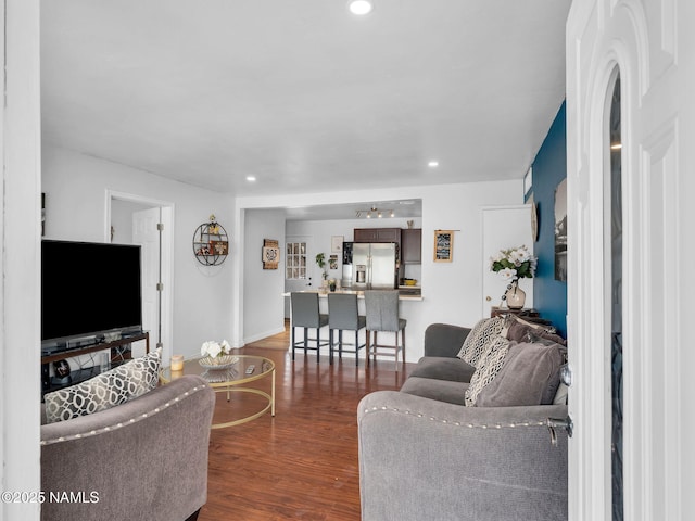 2821 N Tindle Blvd, Flagstaff, AZ 86004 - living room with recessed lighting, baseboards, and wood finished floors
