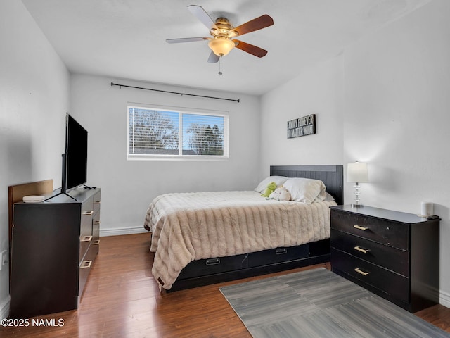 2821 N Tindle Blvd, Flagstaff, AZ 86004 - bedroom featuring baseboards, dark wood finished floors, and ceiling fan
