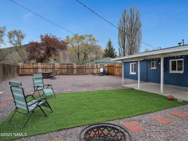 2821 N Tindle Blvd, Flagstaff, AZ 86004 - view of yard featuring a patio and a fenced backyard