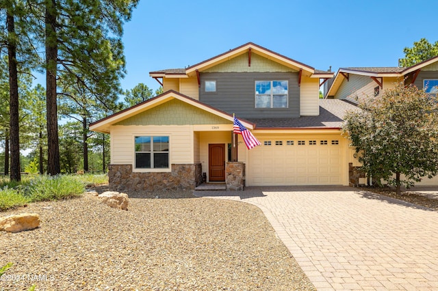 craftsman house featuring a garage