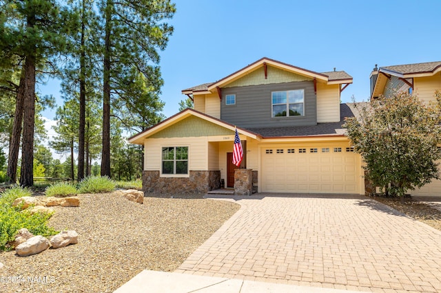 craftsman inspired home featuring a garage