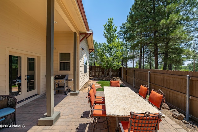 view of patio / terrace featuring french doors and area for grilling