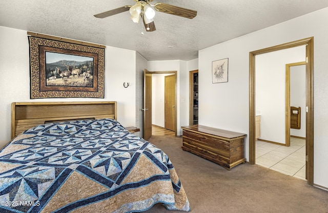 6162 Meadows Ln, Flagstaff, AZ 86004 - carpeted bedroom featuring a textured ceiling, a ceiling fan, and tile patterned flooring