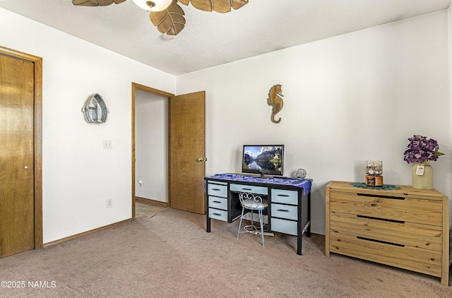 6162 Meadows Ln, Flagstaff, AZ 86004 - carpeted home office featuring baseboards and a ceiling fan