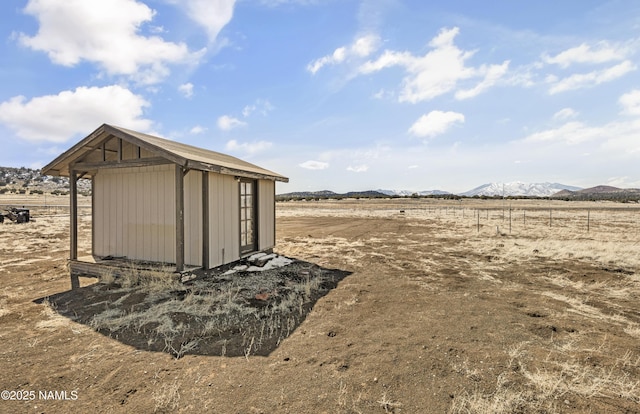 6162 Meadows Ln, Flagstaff, AZ 86004 - view of shed featuring a mountain view and a rural view