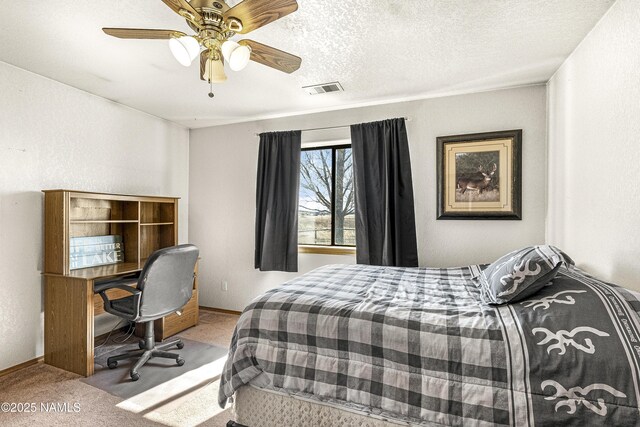 6162 Meadows Ln, Flagstaff, AZ 86004 - carpeted bedroom featuring a ceiling fan, baseboards, visible vents, and a textured ceiling