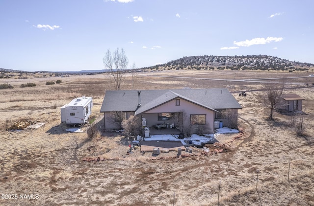 6162 Meadows Ln, Flagstaff, AZ 86004 - rear view of house with a rural view and a patio area