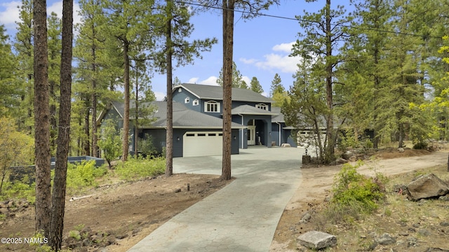 1430 E Puma Pl Unit F, Munds Park, AZ 86017 - view of front of property featuring concrete driveway