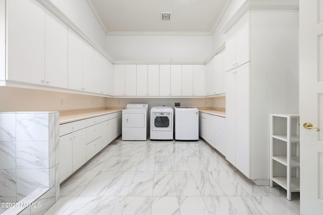 1430 E Puma Pl Unit F, Munds Park, AZ 86017 - laundry area with cabinet space, separate washer and dryer, ornamental molding, and light marble finish floors