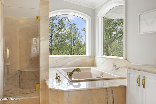 1430 E Puma Pl Unit F, Munds Park, AZ 86017 - full bath featuring healthy amount of natural light, a bath, a marble finish shower, and crown molding
