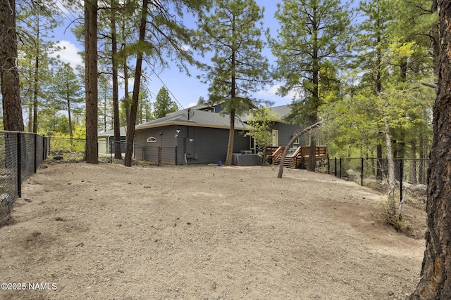 1430 E Puma Pl Unit F, Munds Park, AZ 86017 - fenced backyard featuring a wooden deck