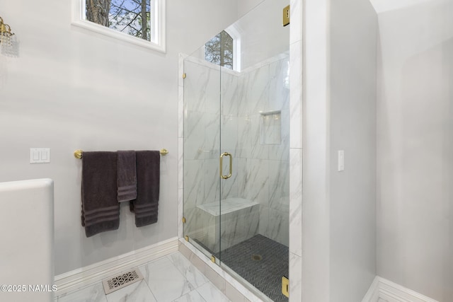 1430 E Puma Pl Unit F, Munds Park, AZ 86017 - bathroom featuring a marble finish shower and marble look tiles