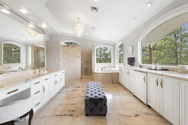 1430 E Puma Pl Unit F, Munds Park, AZ 86017 - full bath with healthy amount of natural light, vanity, a garden tub, a walk in shower, and recessed lighting