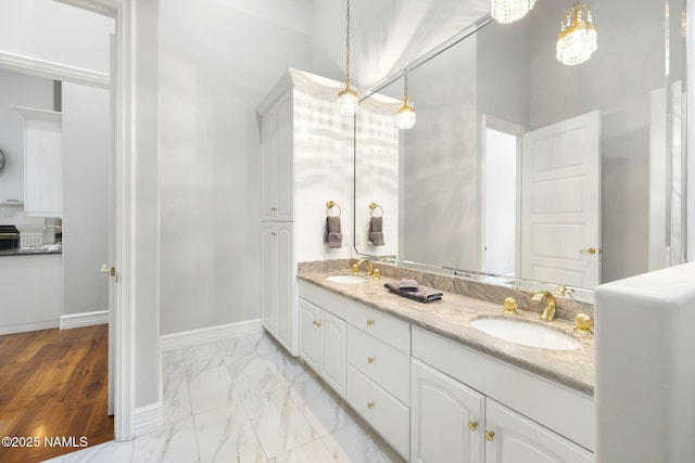 1430 E Puma Pl Unit F, Munds Park, AZ 86017 - bathroom with double vanity and marble look tile flooring