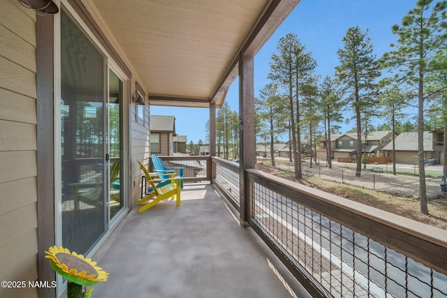 balcony featuring a residential view