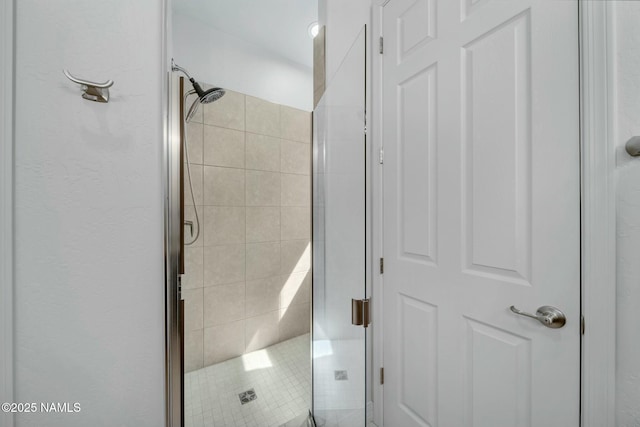 full bathroom featuring a stall shower