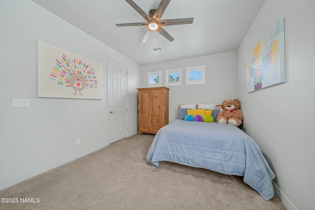 bedroom with carpet flooring, baseboards, and ceiling fan