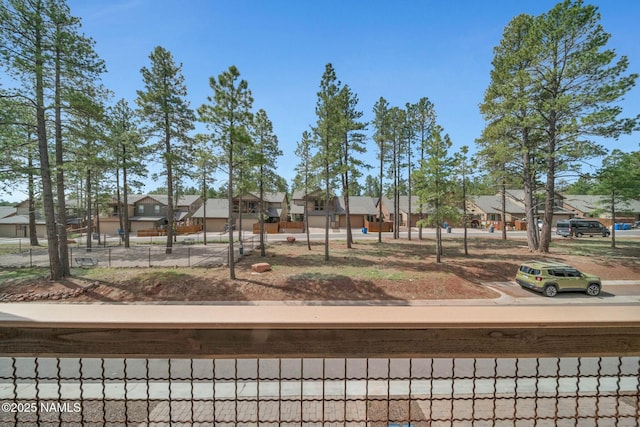 view of yard featuring a residential view