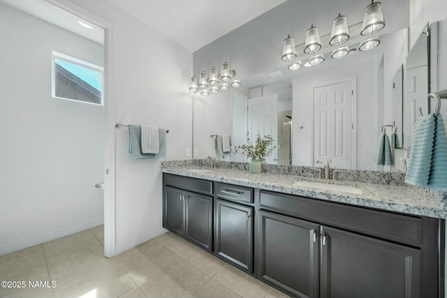 full bathroom featuring tile patterned flooring, double vanity, a shower, and a sink