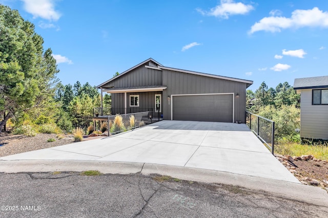 view of front of house featuring driveway and an attached garage