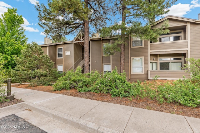 1401 N 4th St Unit 228, Flagstaff, AZ 86004 - view of building exterior with stairs