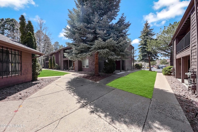 1200 S Riordan Ranch St Unit 36, Flagstaff, AZ 86001 - view of property exterior with a lawn
