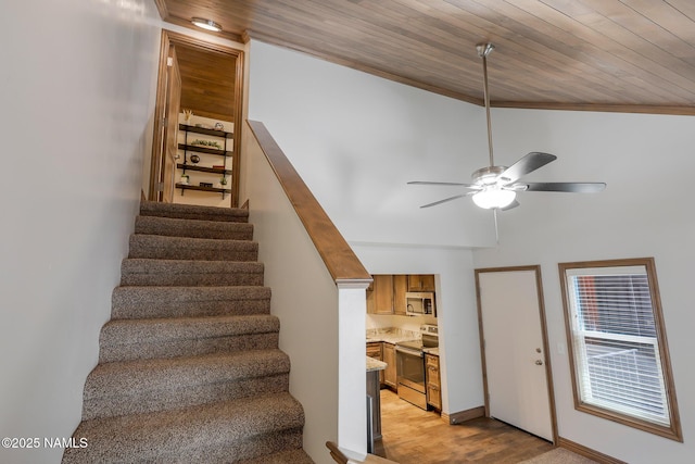 1200 S Riordan Ranch St Unit 36, Flagstaff, AZ 86001 - stairs with high vaulted ceiling, wooden ceiling, a ceiling fan, and wood finished floors