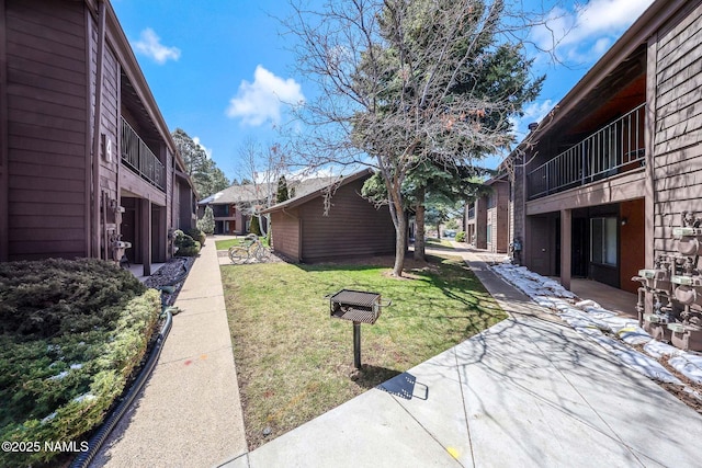 1200 S Riordan Ranch St Unit 36, Flagstaff, AZ 86001 - exterior space featuring a patio and a lawn