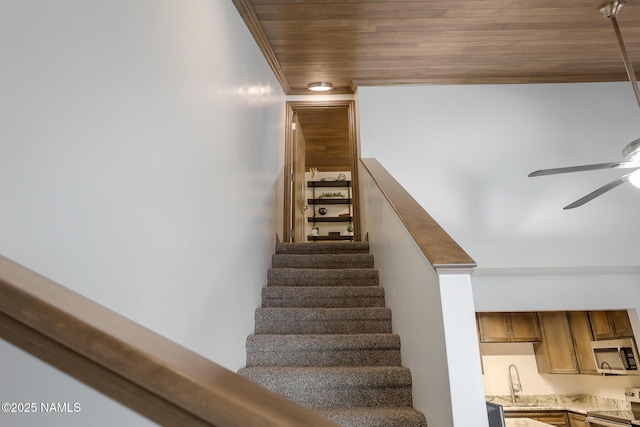 1200 S Riordan Ranch St Unit 36, Flagstaff, AZ 86001 - staircase featuring wood ceiling, a ceiling fan, and crown molding