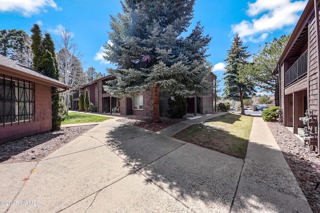 1200 S Riordan Ranch St Unit 36, Flagstaff, AZ 86001 - view of side of home featuring a yard