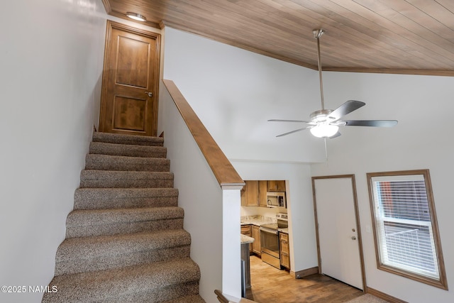 1200 S Riordan Ranch St Unit 36, Flagstaff, AZ 86001 - stairs featuring ceiling fan, lofted ceiling, wood finished floors, and wood ceiling