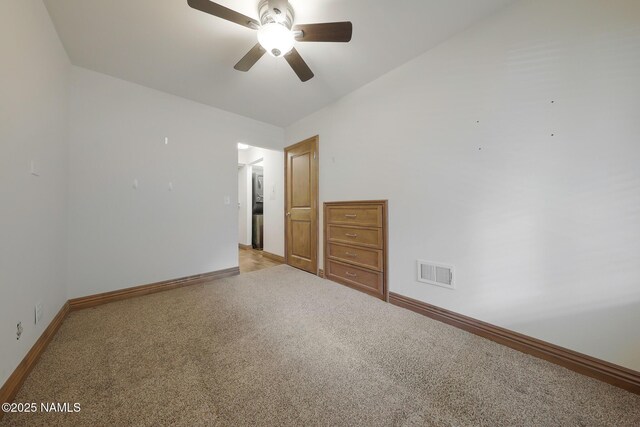 1200 S Riordan Ranch St Unit 36, Flagstaff, AZ 86001 - spare room with baseboards, light colored carpet, ceiling fan, and visible vents