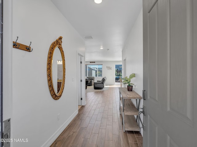 4580 Centaurus Rd, Bellemont, AZ 86015 - hall featuring baseboards, dark wood-style floors, and recessed lighting