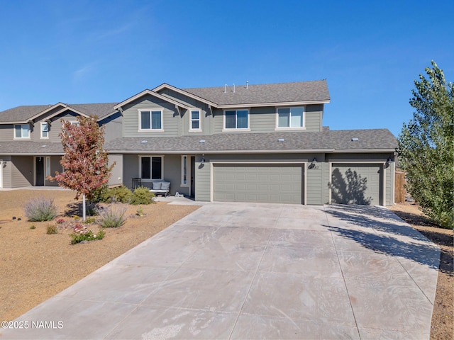 4580 Centaurus Rd, Bellemont, AZ 86015 - traditional-style house with a garage, roof with shingles, and concrete driveway