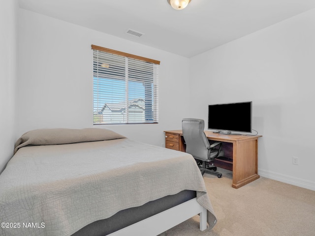 4580 Centaurus Rd, Bellemont, AZ 86015 - bedroom with baseboards, visible vents, and light colored carpet