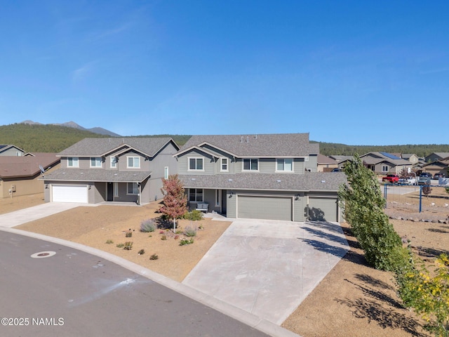 4580 Centaurus Rd, Bellemont, AZ 86015 - view of front of home with a garage, a shingled roof, a residential view, and concrete driveway