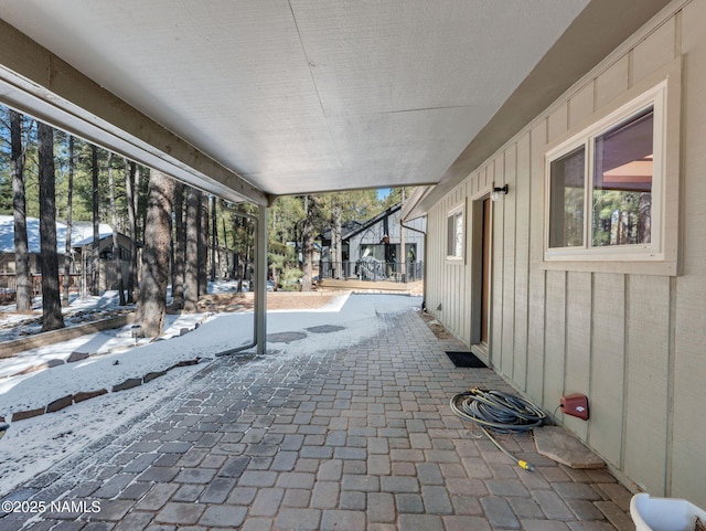 view of snow covered patio