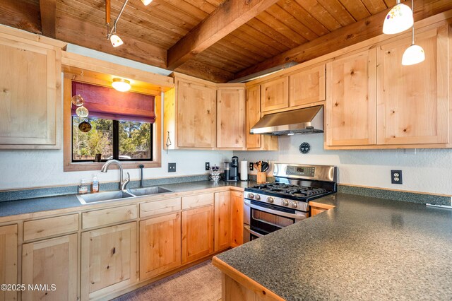 428 Cherokee, Flagstaff, AZ 86005 - kitchen with under cabinet range hood, double oven range, a sink, light brown cabinets, and wood ceiling with exposed beams