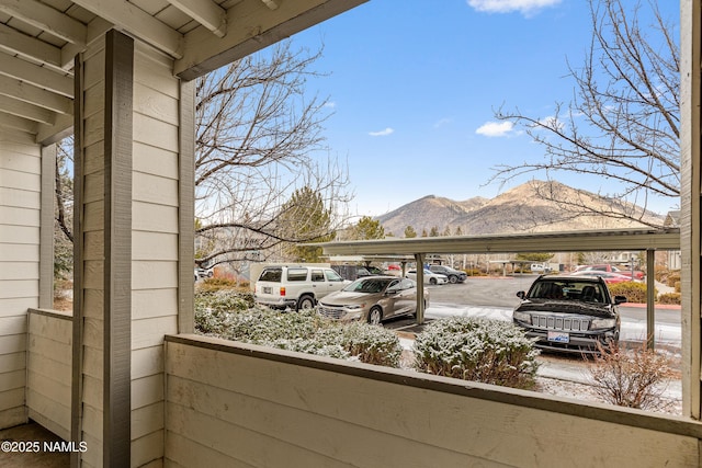 balcony featuring a mountain view