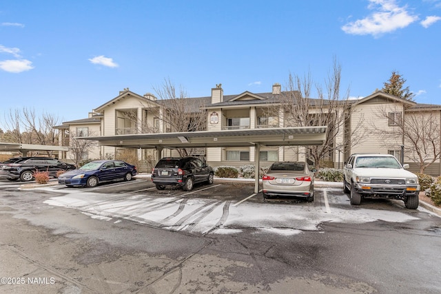 view of parking with a carport