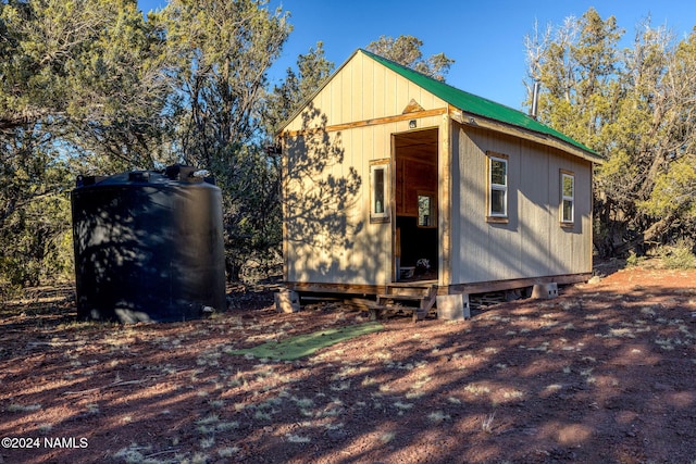 exterior space featuring a storage unit