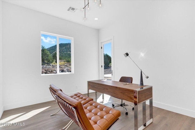 home office featuring light wood-type flooring