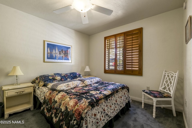 bedroom featuring a ceiling fan, baseboards, and carpet flooring