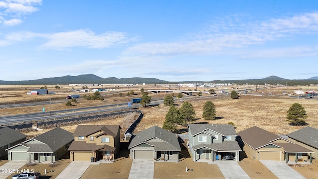 bird's eye view featuring a mountain view and a residential view