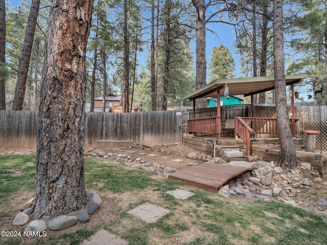 974 W Coy Dr, Flagstaff, AZ 86005 - view of yard with a wooden deck