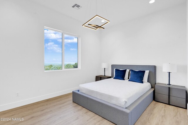 bedroom featuring light hardwood / wood-style floors