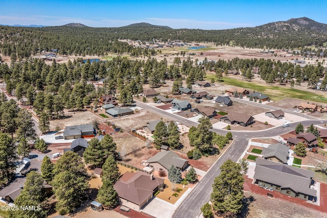 aerial view with a mountain view and a residential view